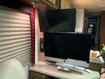 Computer and monitor mounted on bracket